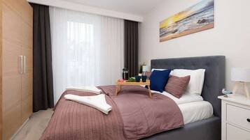 1 slaapkamer, een strijkplank/strijkijzer, wifi, beddengoed