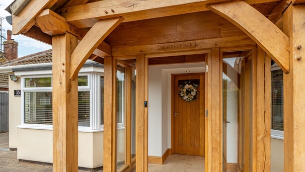 A wooden porch with a sign reading "Grace Cottage." - Grace Cottage, Heacham, Norfolk (Heacham)
