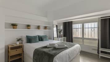 3 dormitorios, tabla de planchar con plancha, wifi gratis y ropa de cama