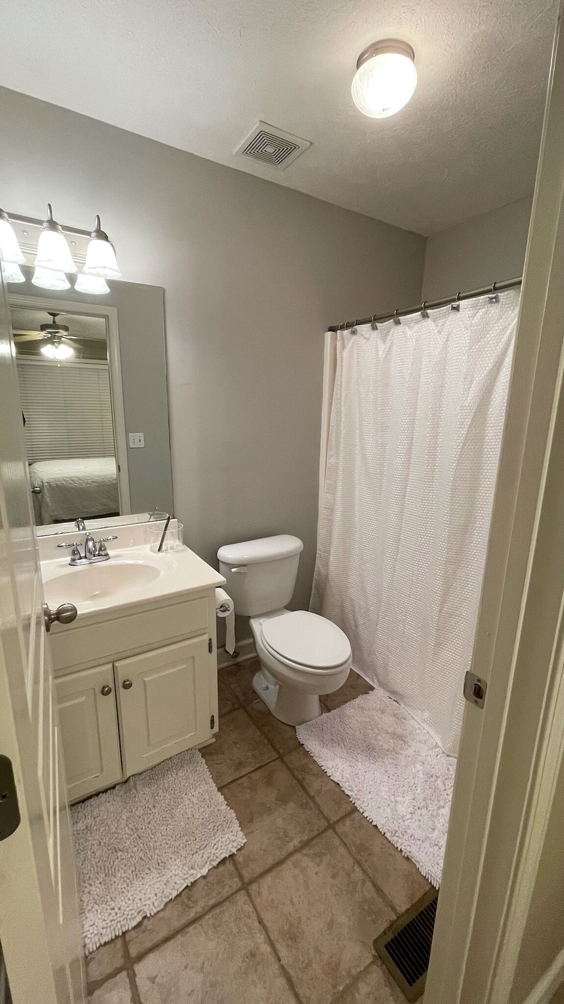 Combined shower/tub, hair dryer, towels, toilet paper