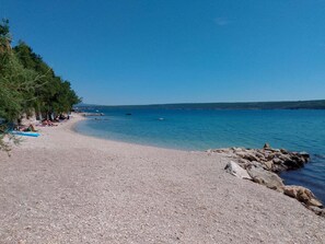 On the beach, sun loungers, beach towels