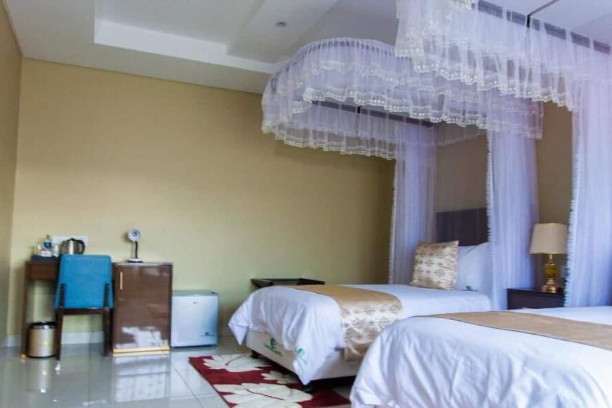 ห้องดีลักซ์ทวิน | เครื่องนอนระดับพรีเมียม, มินิบาร์, โต๊ะทำงาน, พื้นที่ทำงานแบบใช้แล็ปท็อป