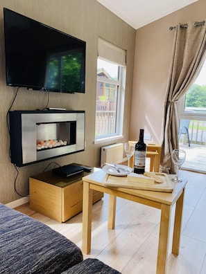Fernseher, Kamin
