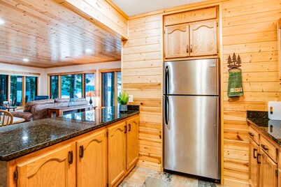 Waterfront cabin with Plum Lake views, private dock, beach access & kayaks