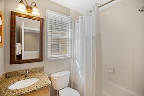 Combined shower/bathtub, hair dryer, towels, soap