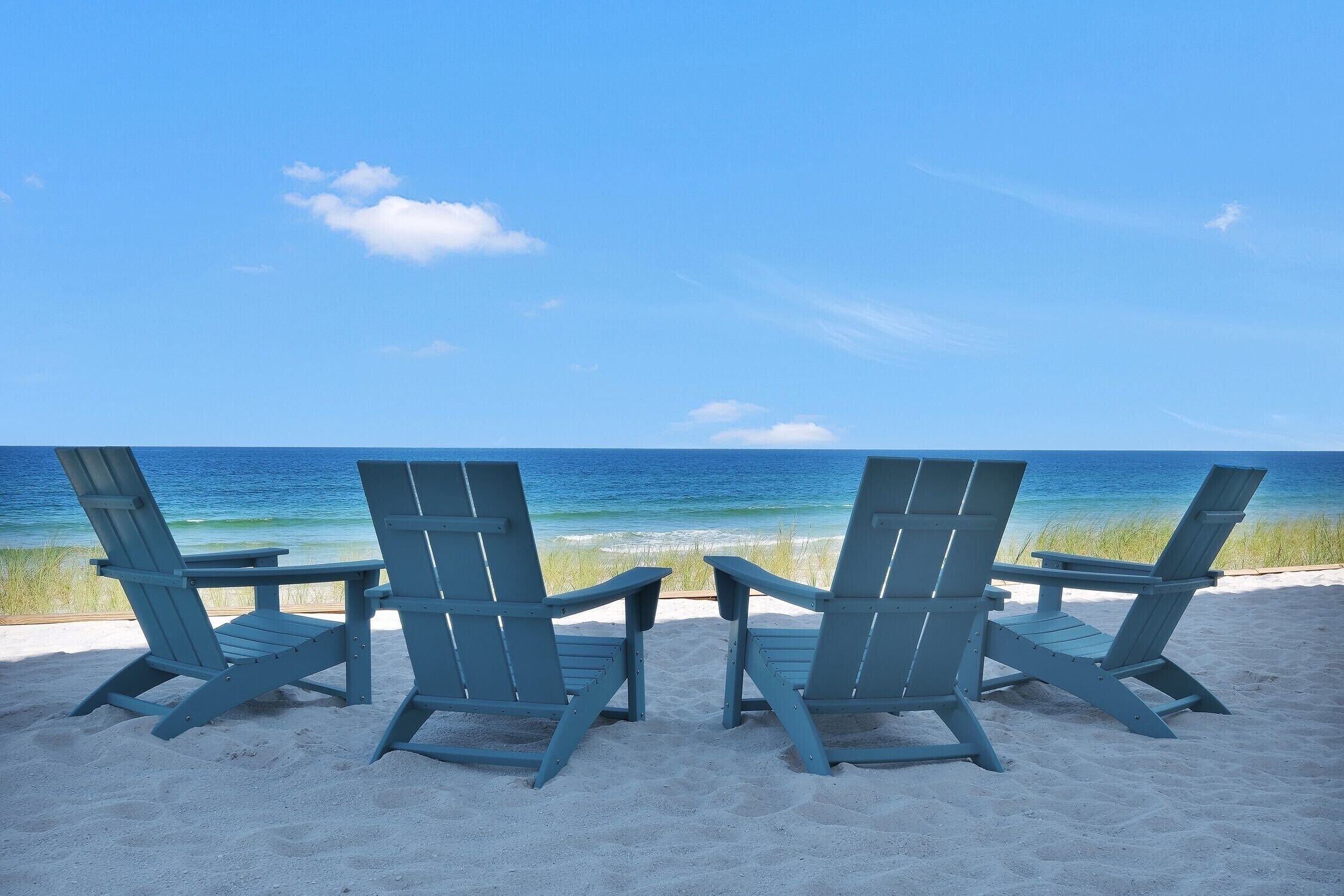 On the beach, sun loungers, beach towels