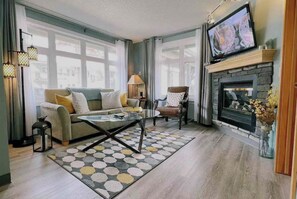 Smart TV, fireplace, books