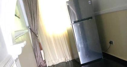 Charming 2-bedroom house with WiFi, AC, Parking in serene Ota winners chapel