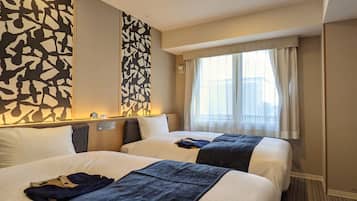 Chambre Ăconomique avec lits jumeaux, non-fumeurs | 1 chambre, couette en duvet d'oie, coffres-forts dans les chambres