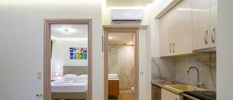 Luxury Apartment, 1 Bedroom | Private kitchen | Fridge, microwave, stovetop, espresso maker