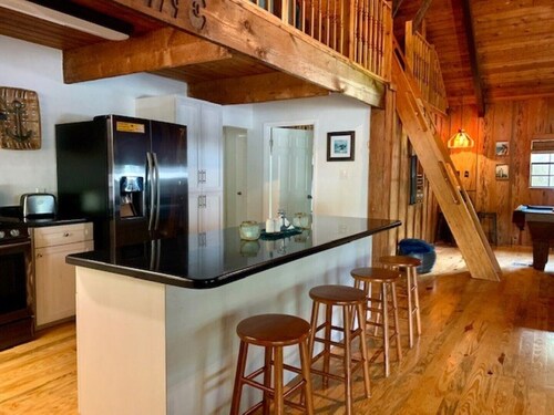 Rustic newly remodeled River House on working fish house property . Gulf access