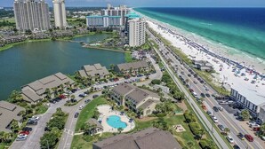 A coastal resort with a beachfront, a marina, and a pool area. - LAKEFRONT~BEACH~GOLF~POOLS~TENNIS~PET FRIENDLY (Miramar Beach)
