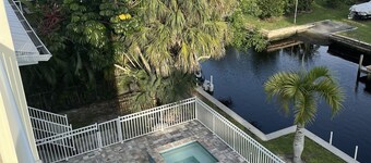 Great reviews,Brand new,waterfront,heated pool, hot tub & beach access -14 pple