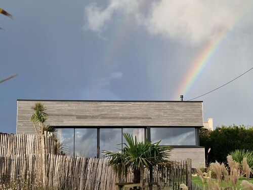 Tresseny, 5 beds , feet in the water with direct access to the beach .