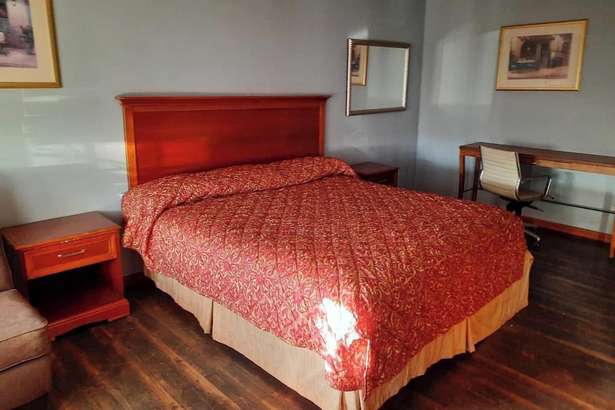 Standaard eenpersoonskamer, 1 kingsize bed | Een bureau, gratis wifi, beddengoed