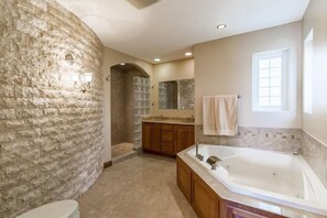 Bathtub, jetted bath, hair dryer, towels