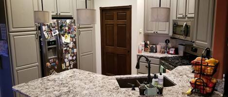 Microwave, dishwasher, coffee/tea maker, cookware/dishes/utensils