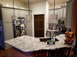 Microwave, dishwasher, coffee/tea maker, cookware/dishes/utensils