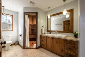 Bathtub, hair dryer, towels, soap