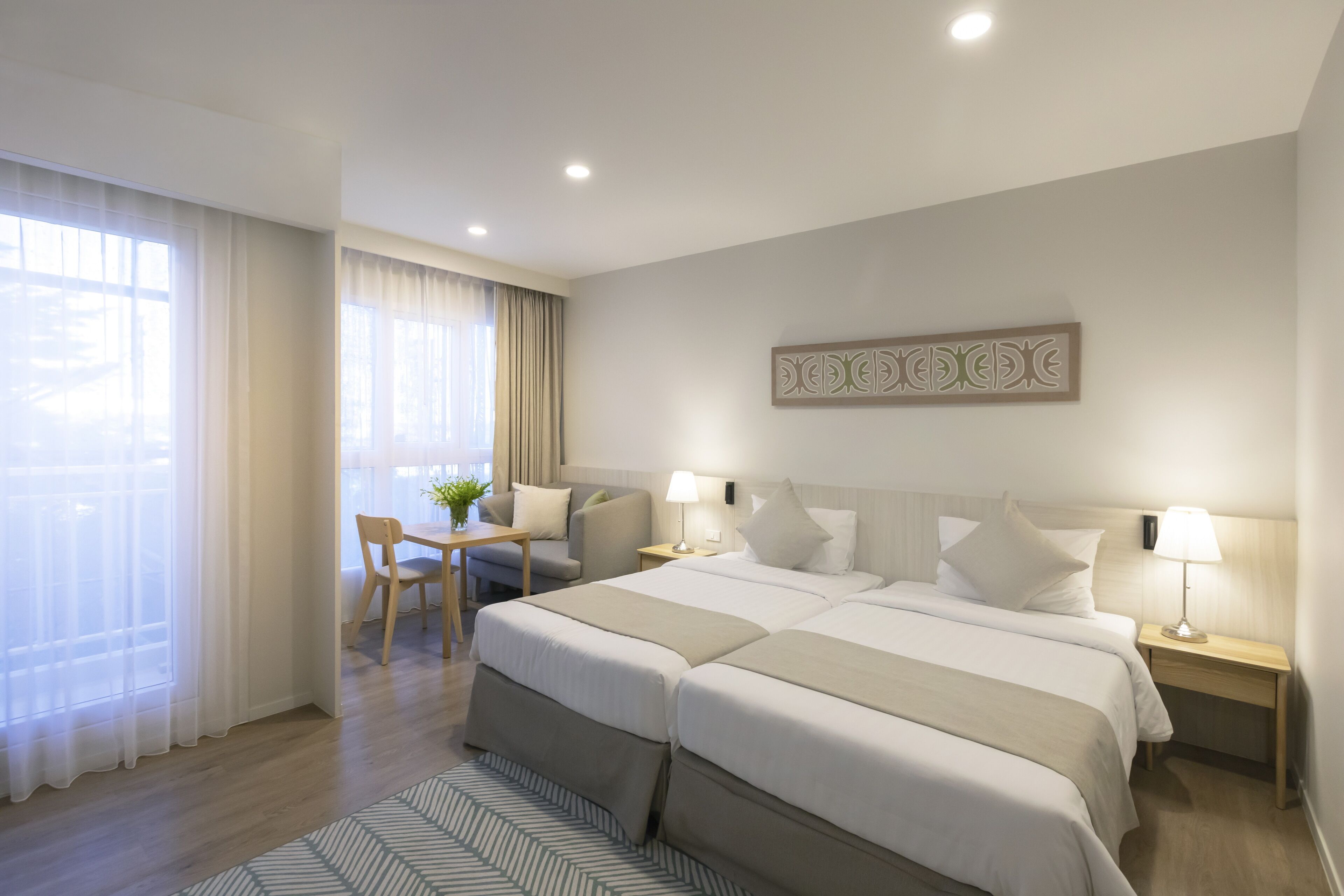 Deluxe Room | Minibar, in-room safe, individually decorated, individually furnished