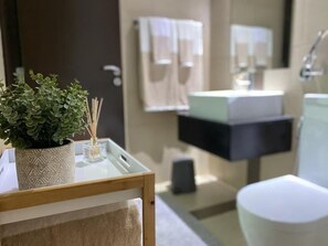 Shower, bidet, towels, soap