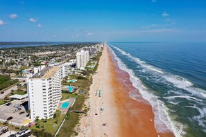 On the beach, sun-loungers, beach towels - DIRECT OCEANFRONT Condo with BREATHTAKING VIEWS! (Ormond Beach)