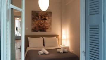 Family Apartment | 2 bedrooms, premium bedding, in-room safe, individually decorated