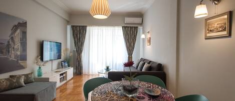 Family Apartment | Living room | 50-inch Smart TV with digital channels, TV, Netflix