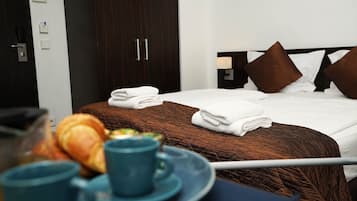 Ropa de cama de alta calidad y minibar