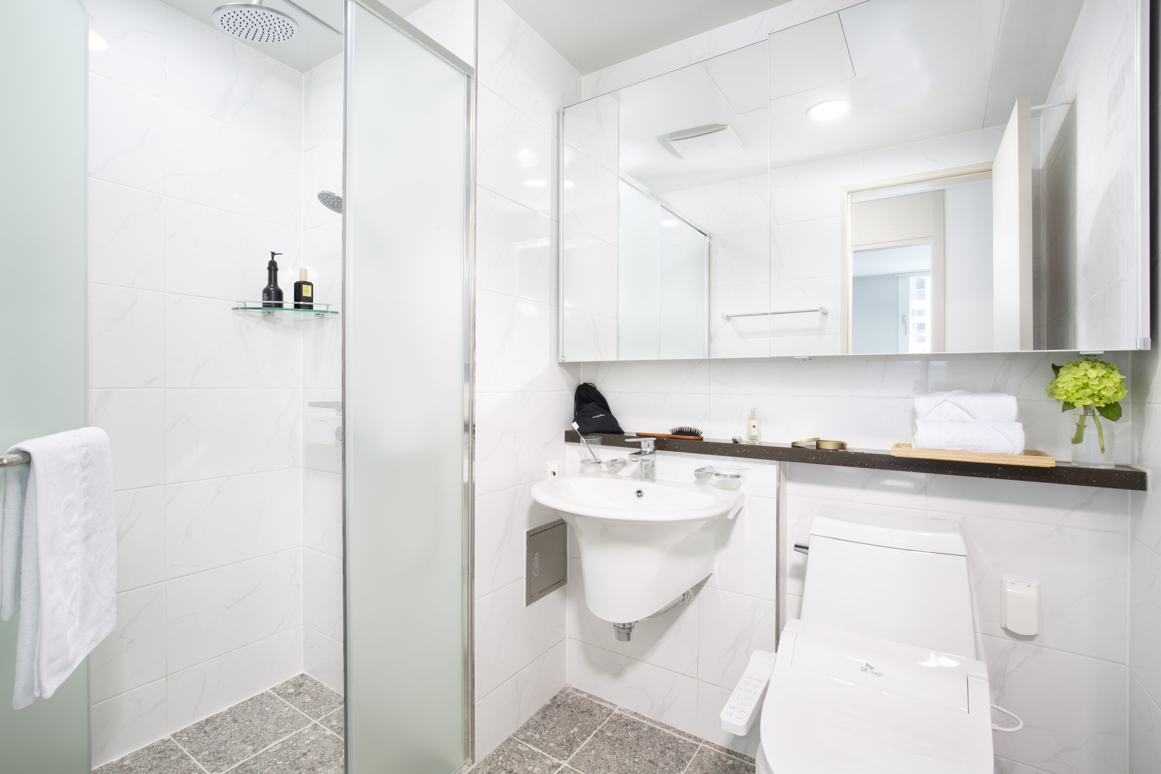 suite | bathroom | shower, slippers, towels, soap