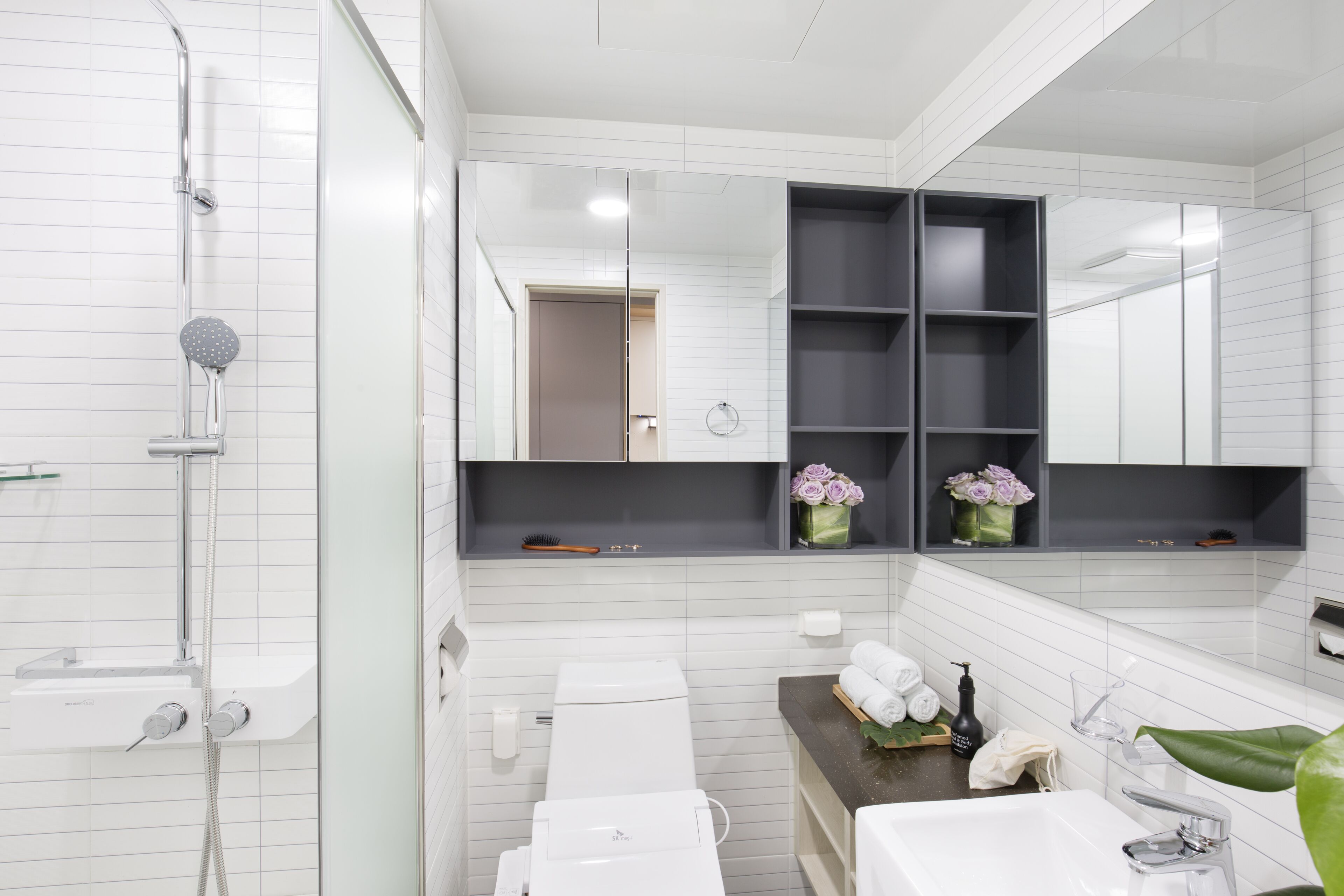 shower, slippers, towels, soap