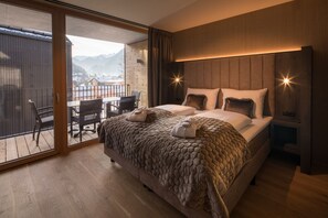 Deluxe Apartment, 2 Bedrooms | Premium bedding, in-room safe, blackout drapes, soundproofing - APART Resort Schruns (Schruns)