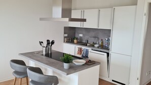 Apartamento conforto, acessível, banheiro privativo | Cozinha privada