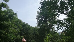 A park with a gazebo, playground equipment, and a grassy area. - Bright 2 room apartment 25min to Europapark (Lahr/Schwarzwald)