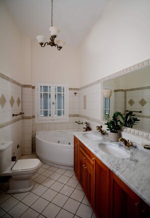 Bathtub, hair dryer, towels, soap