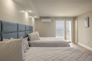 Classic Studio Suite, 2 Double Beds, Balcony, Ocean View | Free WiFi, bed sheets