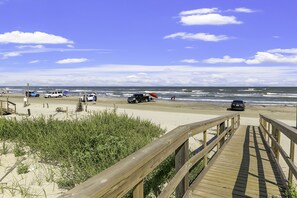 On the beach, sun-loungers, beach towels