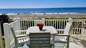 Outdoor dining - "Waters Edge 433-A" - Oceanfront Condo w/ Community Pool, 2 Bedrooms / 2 Bathrooms (Holden Beach)