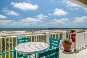 Outdoor dining - "Waters Edge 427-A" - Oceanfront Condo w/ Community Pool, 2 Bedrooms / 2 Bathrooms (Holden Beach)
