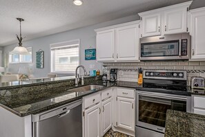Fridge, microwave, oven, stovetop - "Waters Edge 433-D" - Oceanfront Condo w/ Community Pool, 2 Bedrooms / 2 Bathrooms (Holden Beach)
