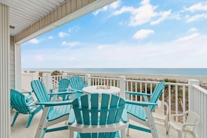Outdoor dining - "Waters Edge 435-B" - Oceanfront Condo w/ Community Pool, 2 Bedrooms / 2 Bathrooms (Holden Beach)