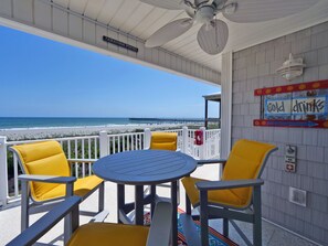 Outdoor dining - "Waters Edge 435-A" - Oceanfront Condo w/ Community Pool, 2 Bedrooms / 2 Bathrooms (Holden Beach)
