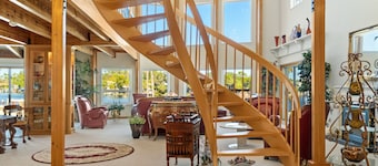 Riverfront views. Sleeps 12 with private dock.