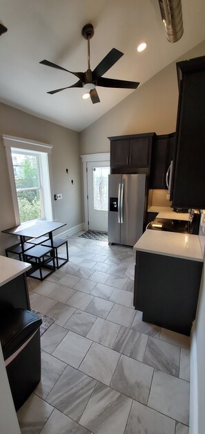 Fridge, microwave, oven, stovetop - NEWLY RENOVATED Luxurious SOULARD 2nd Floor Townhome overlooking AB Brewery! (St Louis)