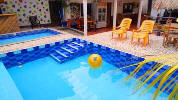 2 outdoor pools, pool loungers