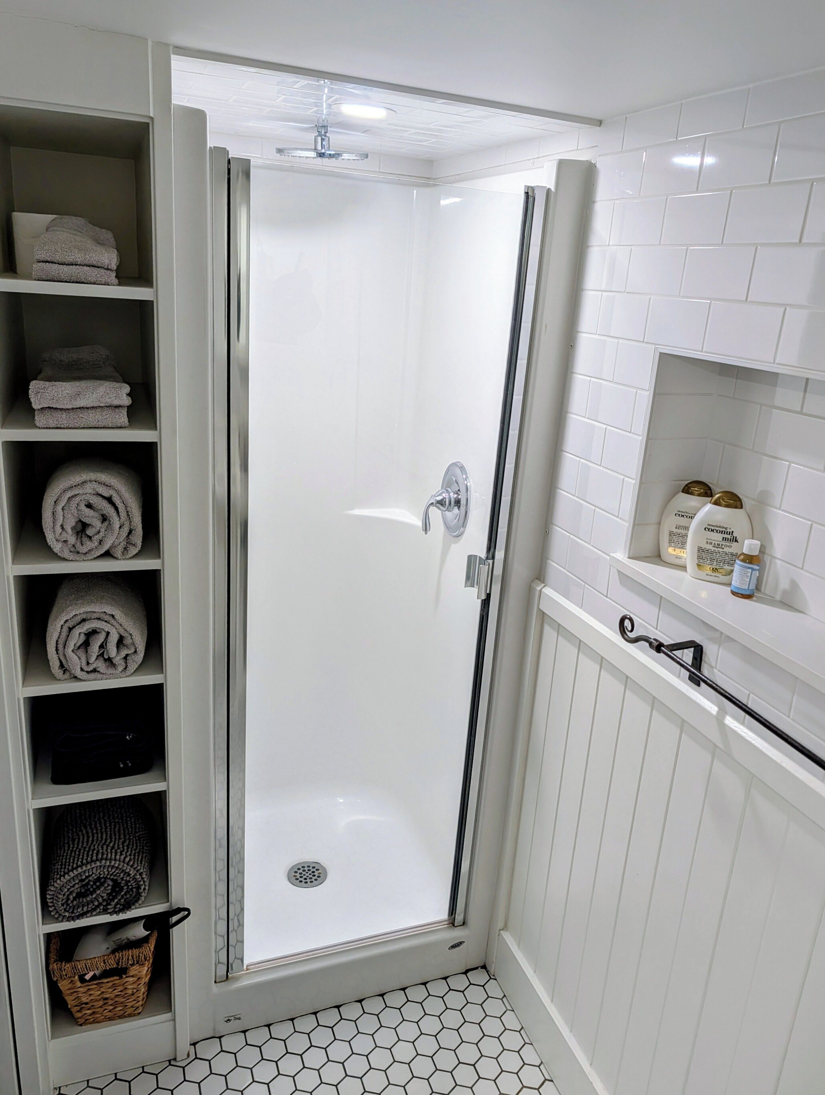Shower, hair dryer, towels, shampoo