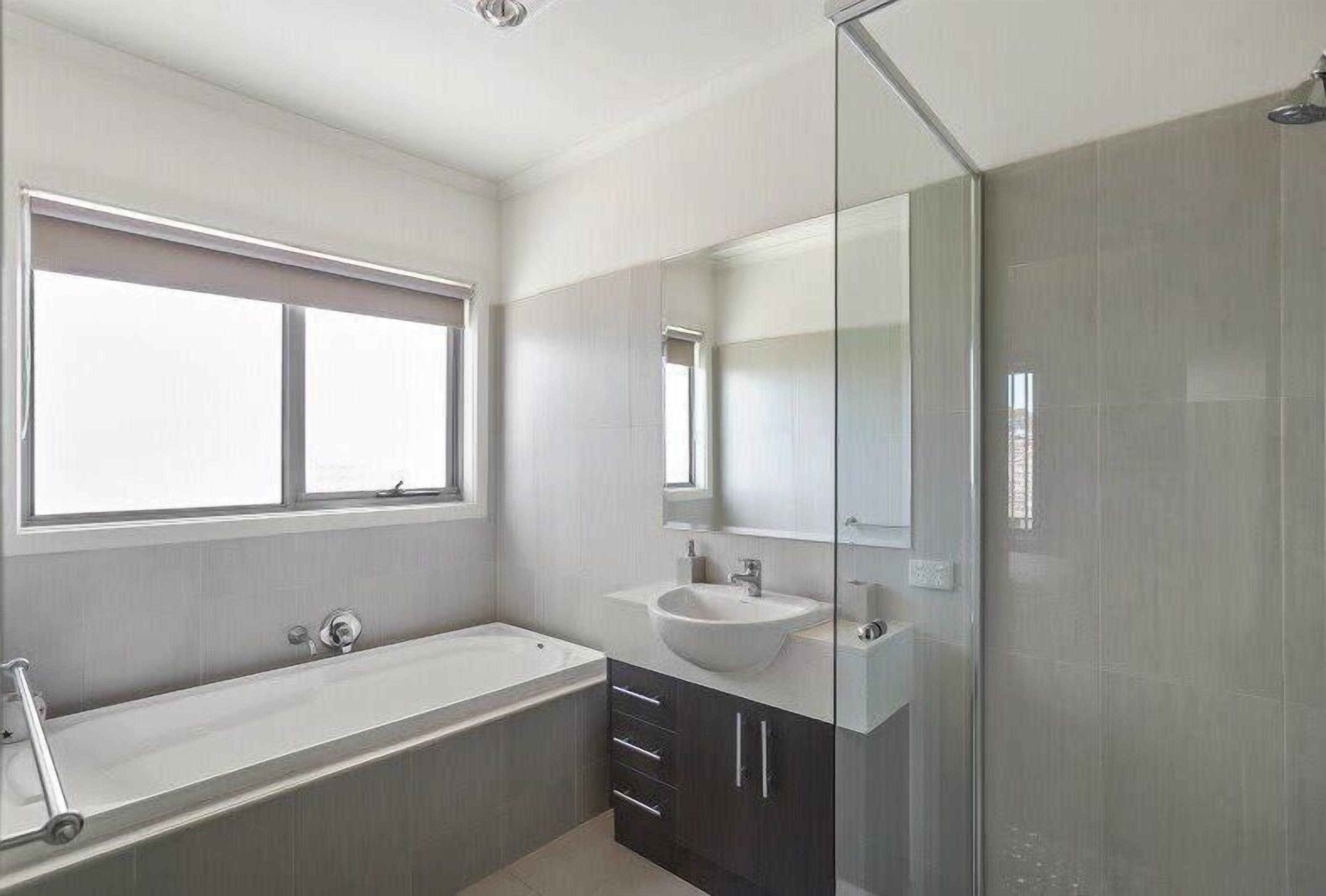 Bathtub, towels, shampoo