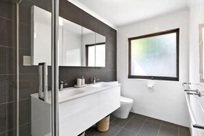 Shower, hair dryer, towels