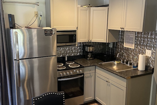 Refrigerador, microondas, horno, placa de cocina