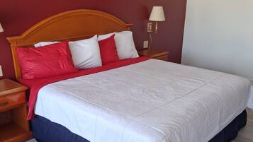 Habitación de lujo, 1 cama King size, para no fumadores | Escritorio, espacio para trabajar con laptop y cortinas blackout